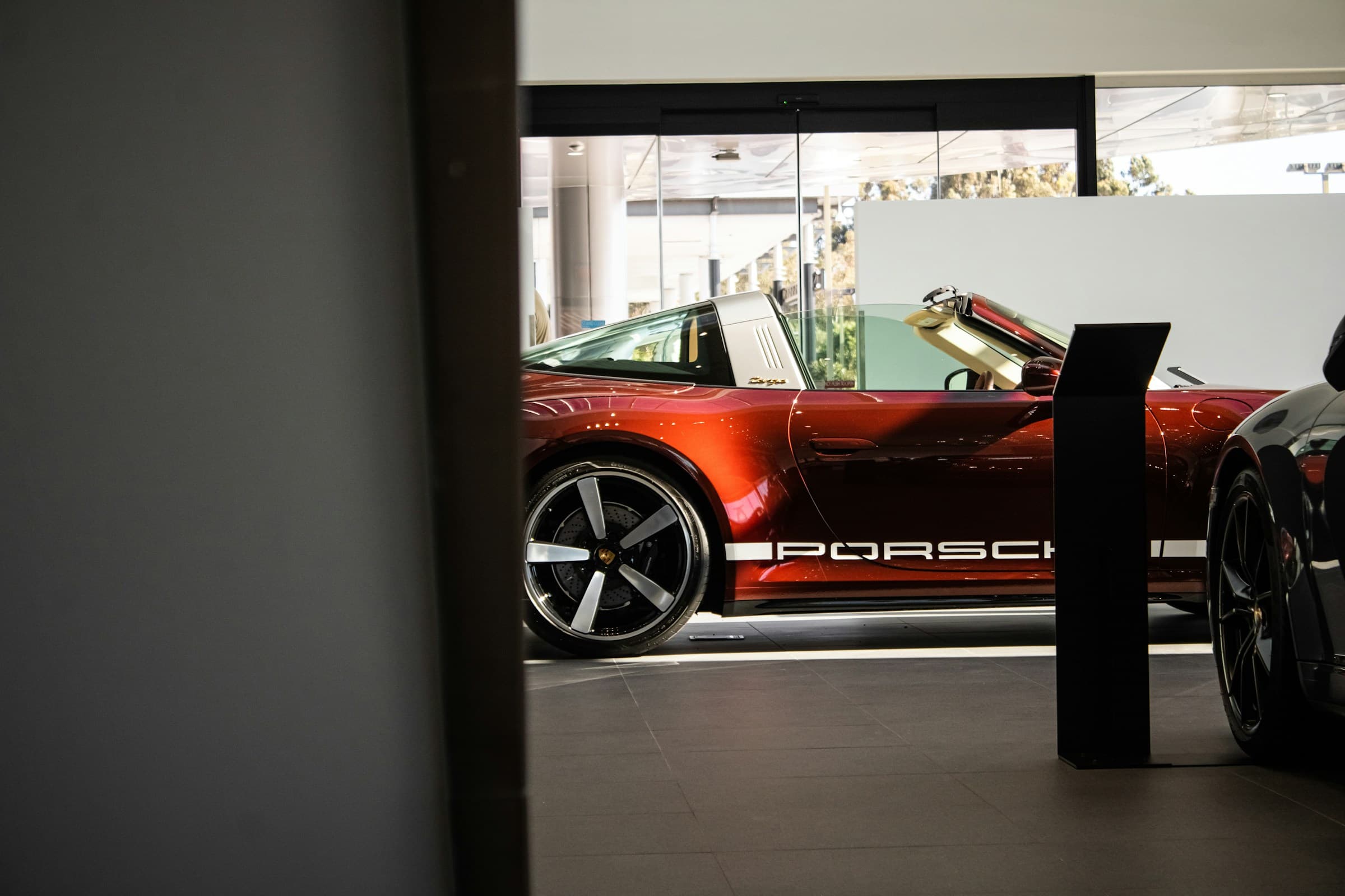 2026 Porsche 911 plug-in hybrid on track with PHEV system visible